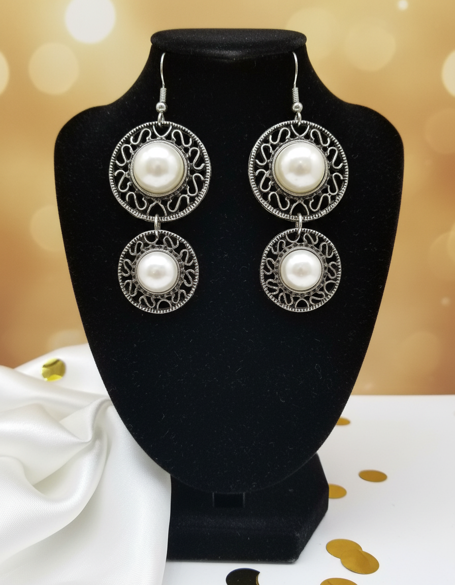 Silver tone dangle earrings